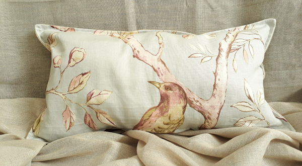 Lumber Cushion in Peach Bird in Tree Design
